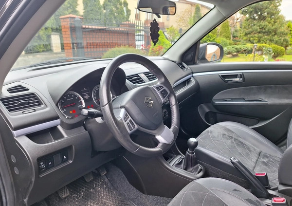 Suzuki Swift cena 34700 przebieg: 100200, rok produkcji 2015 z Żychlin małe 326